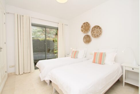 Twin bedroom 2 bedroom apartment for rent with indoor pool, gym and private garden, Marbella, Costa del Sol, Spain