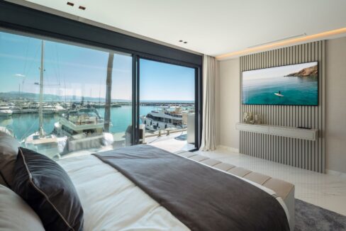 Bedroom with sea and port views - puerto banus apartment for sale